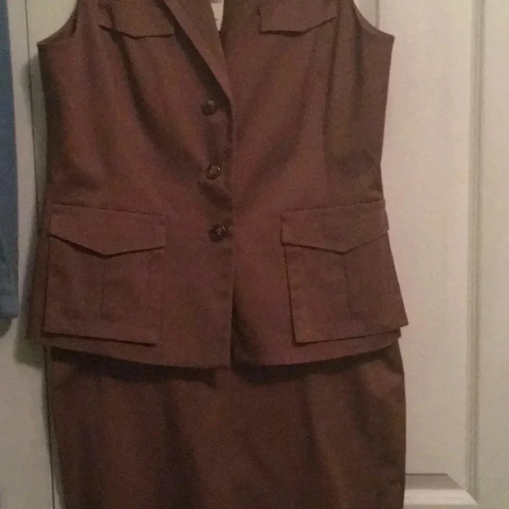 NYC sleeveless suit top and matching skirt
